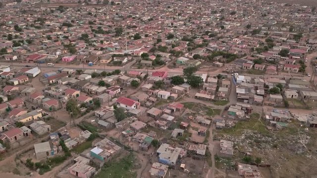 Poverty and inequalities of an expansive township low cost housing and informal shacks in South Africa.
