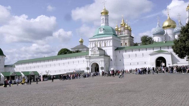 SERGIYED POSAD, RUSSIA - AUGUST 3, 2019: The Trinity Lavra of St. Sergius is the most important Russian monastery  . The monastery is situated in the town of Sergiyev Posad. unidentified people.