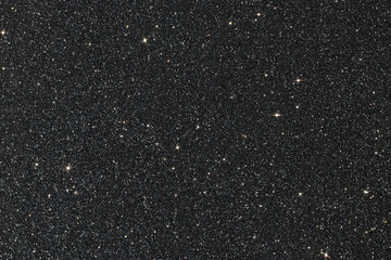 glitter vintage lights background. black and silver. de-focused