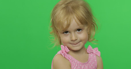 Pretty child in pink swimsuit. Portrait close up. Chroma Key