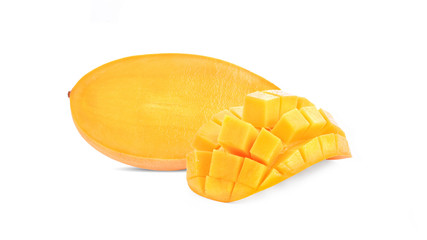 Ripe yellow Mangoes cut half in cubes isolated on white background.