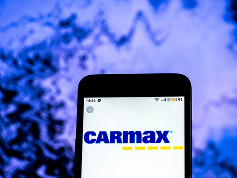 Kiev, Ukraine, December 18, 2018, illustrative editorial. CarMax Company logo seen displayed on smart phone