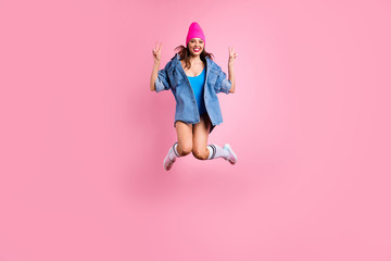 Full length photo of cute youngster making v-signs wearing blue bodysuit swimsuit white knee-socks stockings isolated over pink background