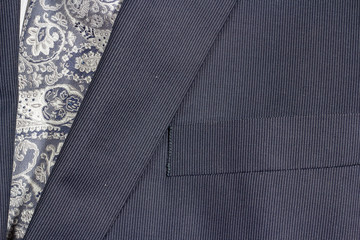 Business suit pocket and tie, close up