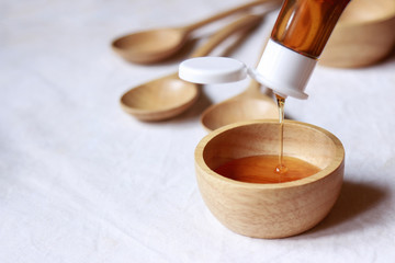 dropping honey for making drink 