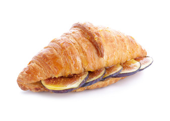 Sweet croissant and fig fruit slices on white background