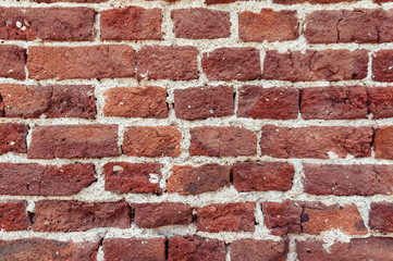 Red brick wall outdoor background. Stone texture.