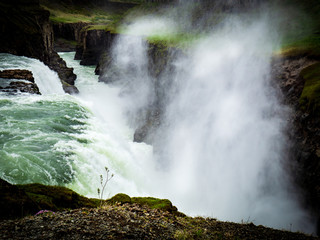 Gullfoss waterfall with dark clouds in Iceland
