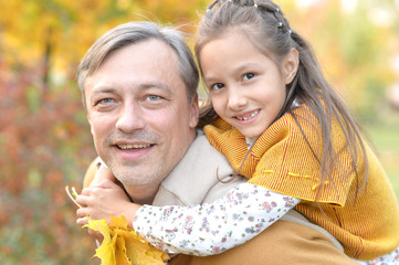 Portrait of father and daughter having fun