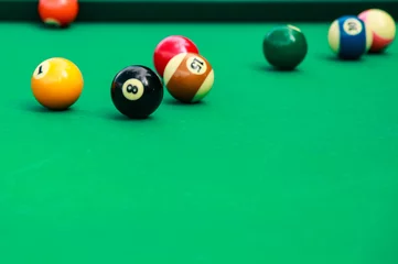 Foto op Plexiglas Multicolored billiard balls on green cloth. Lighting fluorescent light © krot44