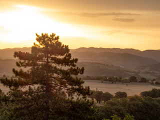 Golden sunset and hills of Umbria, Italy.