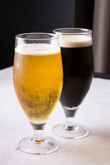 Dark and light beer glasses on a table