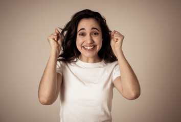 Cute beautiful teenager girl dancing feeling happy celebrating success or winning