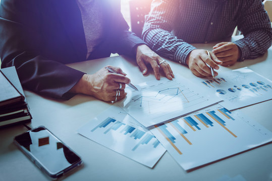 Middle-aged Asian business man Discuss problems and opportunities for business growth.