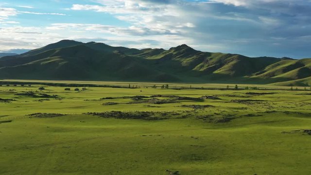 Aerial view of steppe and mountains landscape in Orkhon valley, Mongolia, 4k
