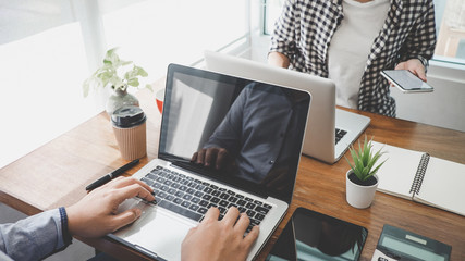 Business casual team meeting working with new startup project, discussion and analysis data the charts and graphs, computer using, Business finances and strategy accounting concept