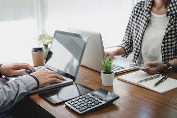 Business casual team meeting working with new startup project, discussion and analysis data the charts and graphs, computer using, Business finances and strategy accounting concept