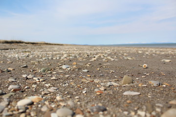 beach, sea, stone, water, nature, sky, coast, stones, rock, landscape, pebbles, blue, sand, ocean, summer, shore, desert, rocks, pebble, travel, texture, coastline, pattern, cloud