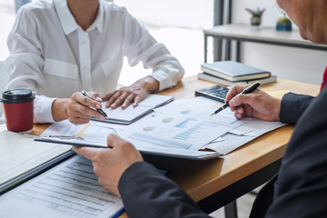 Business team consultant working with new startup growth project plan and discussion analyzing for financial strategy statistics with computer, results of collaboration their successful teamwork