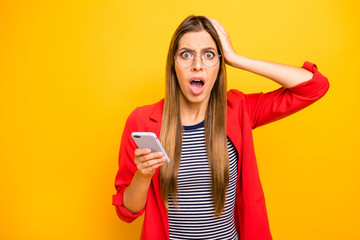 Portrait of impressed youth shouting touching her head wearing eyeglasses eyewear isolated over yellow background