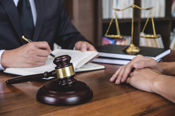 Customer service good cooperation, Consultation between counselor or male lawyer and businesswoman customer, tax and the company of real estate concept