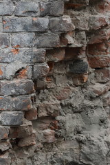 Old broken brick wall background