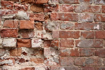 Old broken brick wall background