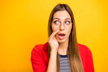 Close-up portrait of her she nice attractive lovely cute smart clever foxy sly cunning straight-haired lady sharing good news isolated over bright vivid shine yellow background