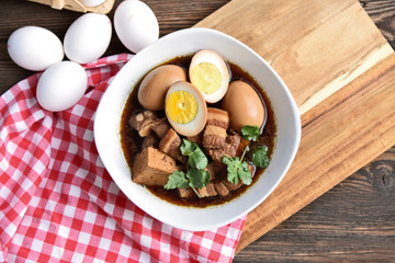 Thai Stewed Pork & Eggs with Five Spices (Thai name is Kai Pa Lo)..Famous Thai egg menu.