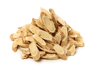 Chinese Herbal medicine - Astragalus slices, Huang Qi (Astragalus propinquus) on white background