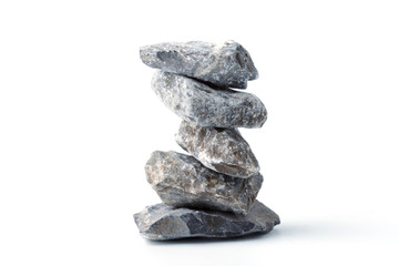 Fototapeta na wymiar Pyramid of stones, isolated on white background. Zen Concept. Peaceful Concept.