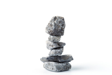 Pyramid of stones, isolated on white background. Zen Concept. Peaceful Concept.