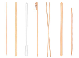 A collection of sticks, stirrers and toothpicks, and skewers canapes on an isolated white background