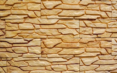  texture in the form of a stone wall sand color with a careless pattern  
