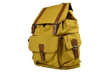 Canvas Backpack accessories isolated hipster background white. brown with yellow mustard canvas bag. Hand made backpack for travelers. Side view