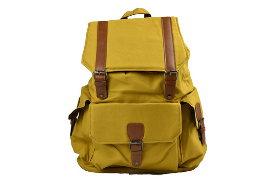 Canvas Backpack accessories isolated hipster background white. brown with yellow mustard canvas bag. Hand made backpack for travelers. front view