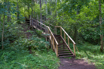 Wooden path and stairs leading to Staburags cliff of Rauna. Latvia. Baltic..