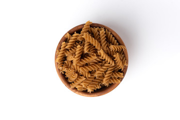 Whole grain pasta isolated on white background.