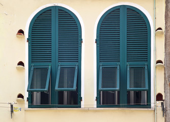 Beautiful Green shuttered windows in Italy.