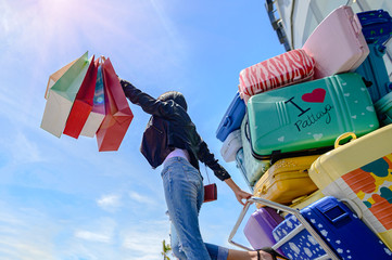 woman enjoy shopping on the sea beach mall center, cheerfully at shopping mall beach, hand up to...