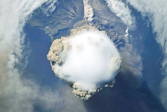 Eruption volcano from space. Elements of this image were furnished by NASA