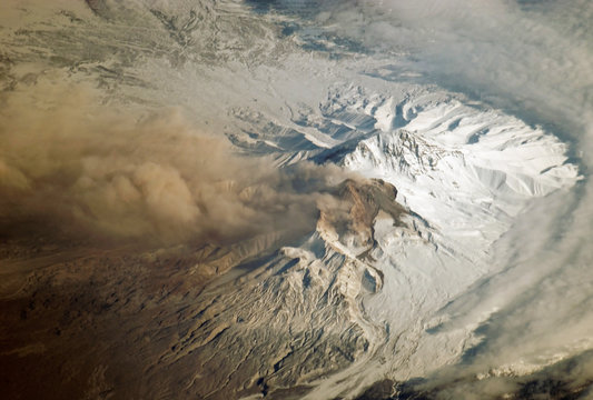 Eruption volcano from space. Elements of this image were furnished by NASA