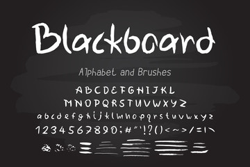 Fototapeta premium White chalk vector alphabet and brushes. Hand drawn English uppercase and lowercase letters, numbers, punctuation marks. Lettering typeface and brush strokes, blackboard background, for grunge design
