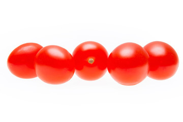 A group of fresh red cherry tomatoes