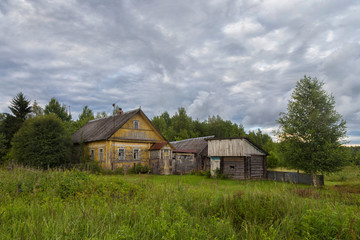 Fototapeta na wymiar Wooden chopped Russian house. Skobar house.