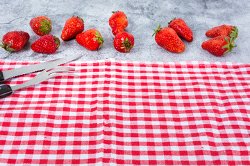Flat lay composition with chocolate covered strawberries on grey background