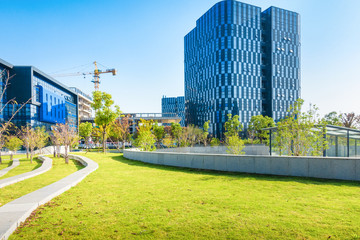 empty brick floor with modern building in background