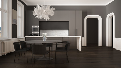 Minimalist gray and black kitchen in classic room with moldings, parquet floor, dining table with chairs, marble island and panoramic windows. Modern architecture interior design