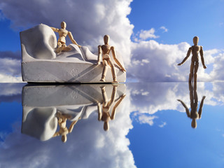 Plaster head model cast for drawing on mirror and three small wooden manikins