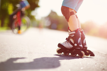 child on roller Skates in the evening